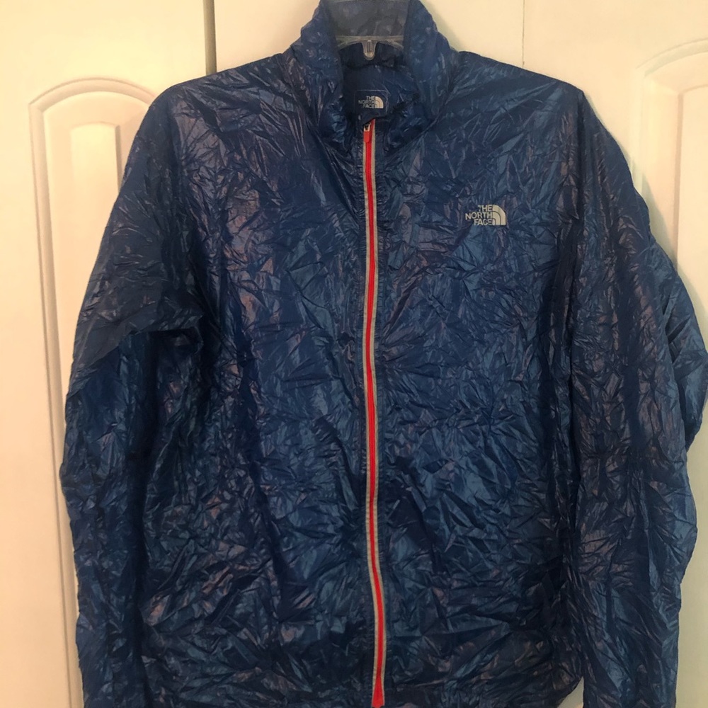 The North Face reflective emergency windshell